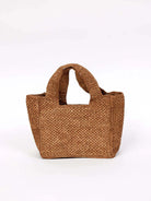 Light brown, woven rectangular bag with top handles.  Closely woven texture.