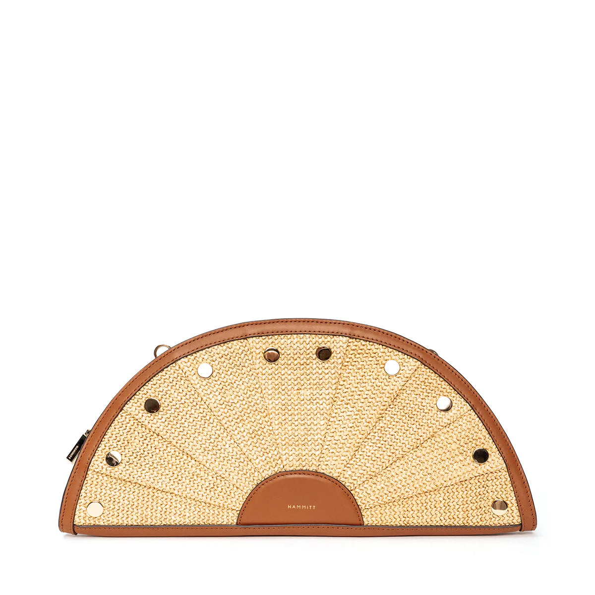 Fan-shaped light tan woven straw clutch with brown leather trim and alternating gold and silver studs.