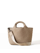 Light beige woven tote bag with two top handles and a removable shoulder strap with silver hardware.