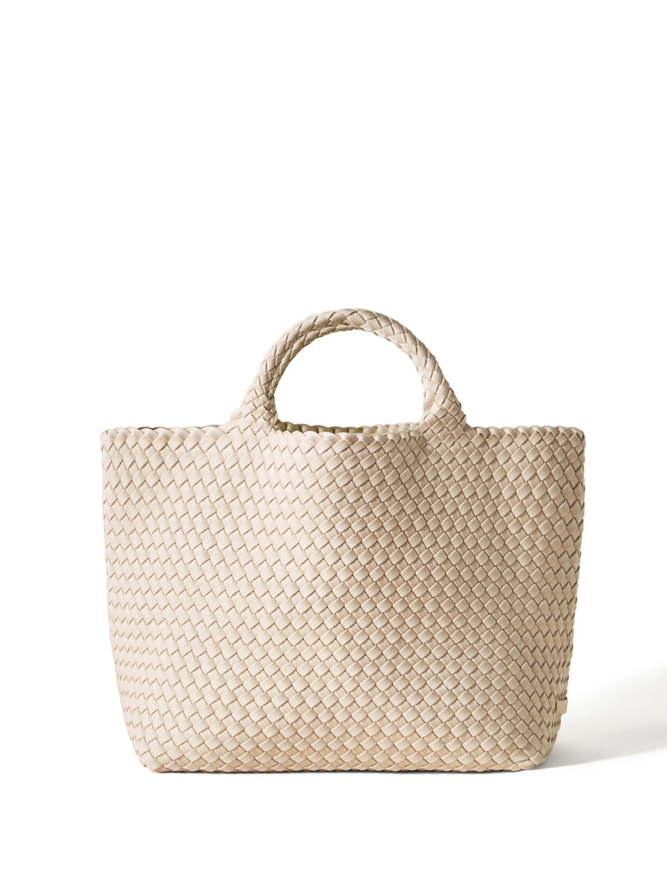 Beige woven tote bag with braided handles.  The woven pattern is prominent.