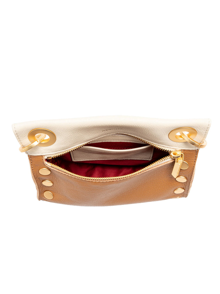 Here's alt text for the image, suitable for visually impaired users:

"Tan and off-white leather handbag; gold zipper,...