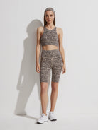 Varley Harris Bra: High-neck cropped bra with dark brown abstract spots on a light beige background.