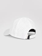 White baseball cap with small, regularly spaced perforations.  Black back strap and subtle branding.