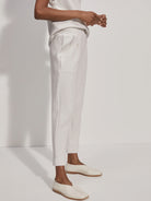 Light gray, rolled-cuff pants; cropped,  pull-on style with pockets.