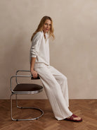 Oatmeal marl wide-leg pant with a visible front seam, worn by a model.