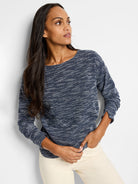 Indigo and white speckled long-sleeve top with boat neck.
