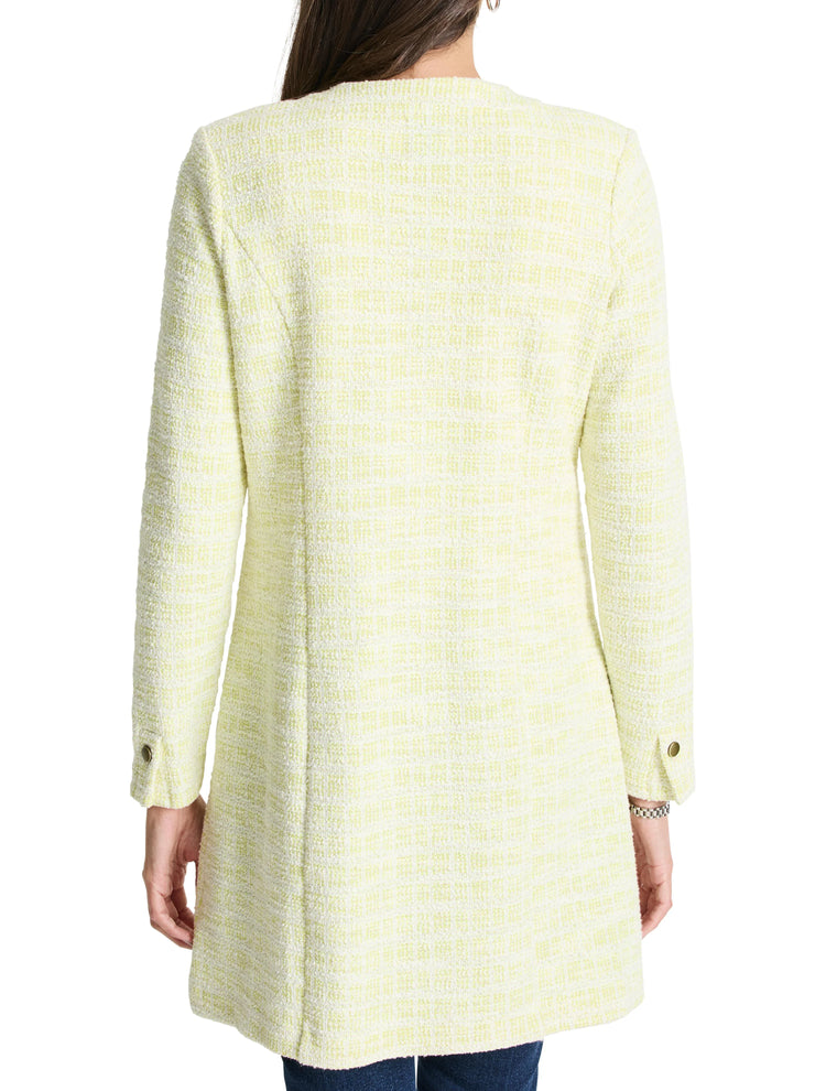 Pale yellow knit jacket with a subtle textured, checkered pattern.  Long sleeves, buttoned cuffs.  A-line silhouette.