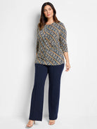 Vintage Batik drape top; navy, teal, and tan pattern, 3/4 sleeves, round neck.