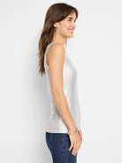 Silver ribbed tank top; sleeveless, close-fitting.  Slight shimmer.