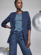 Navy blue Ponte zip jacket.  Features a single button and a visible side zipper.