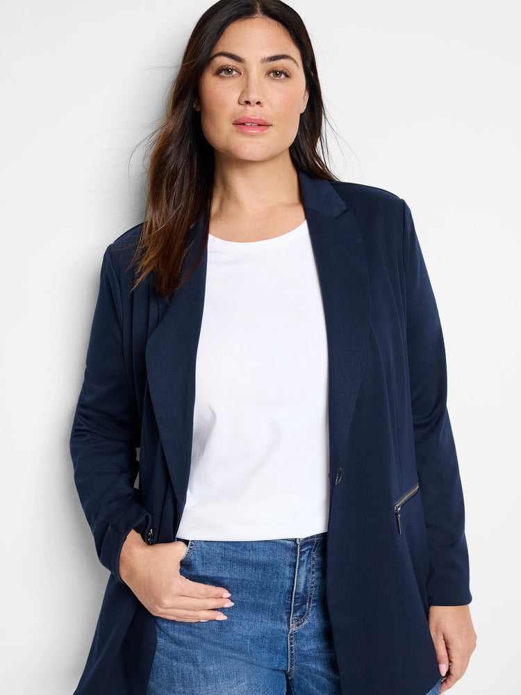 Navy blue zip-front jacket; single button.  Features a side zip pocket.