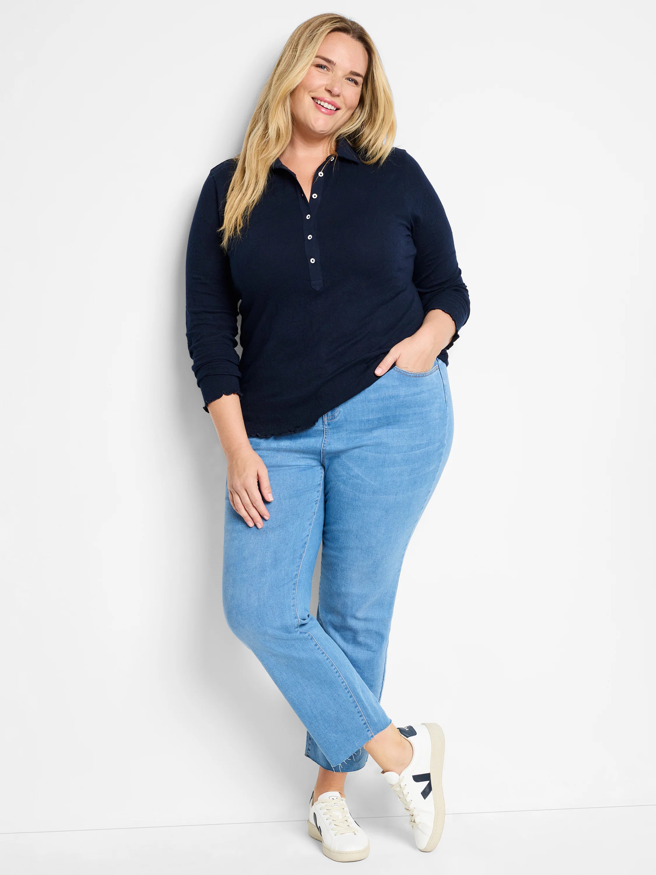 Navy lace knit collared top with white buttons, 3/4 sleeves, and scalloped edges.