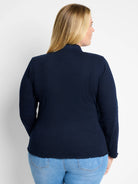 Navy blue collared lace knit top, back view. Long sleeves and a scalloped hem.