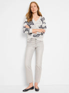 Light gray V-neck sweater with a dark gray abstract cloud pattern.