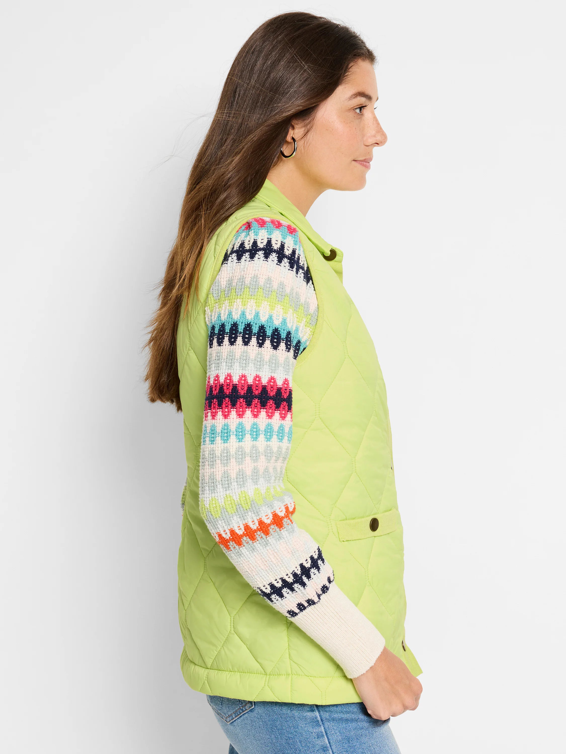 Lime green quilted puffer vest.  Features a diamond pattern and visible knit trim.