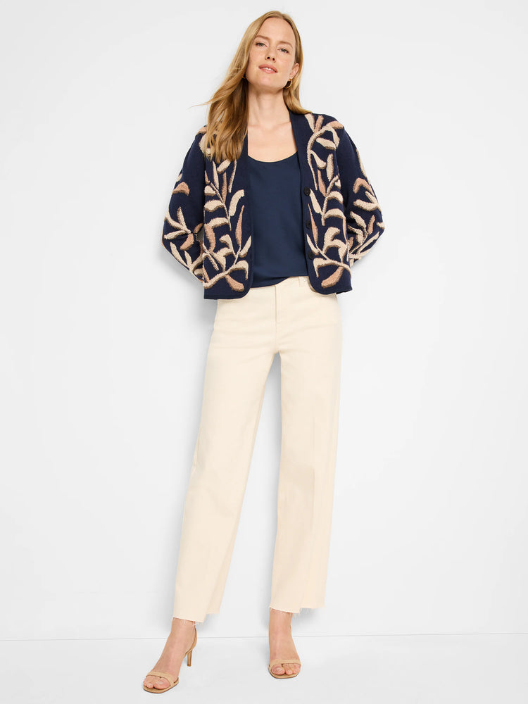 Navy blue knit jacket with beige leaf pattern.  Button front.