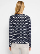 Here's alt text for the image, under 125 characters:

"Navy blue and off-white sweater tee with textured, checkered...
