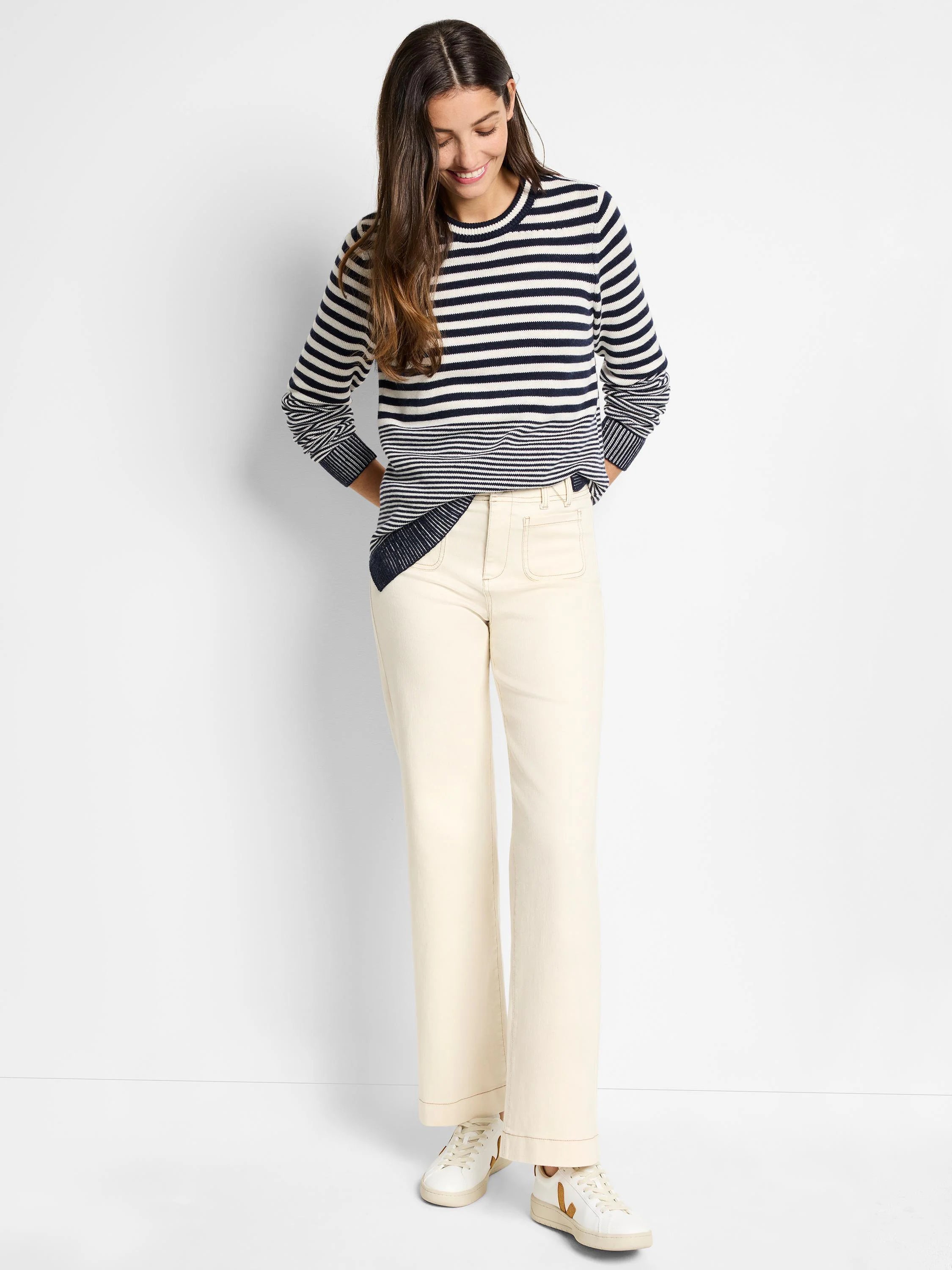 Cream and navy blue horizontally striped sweater.  Long sleeves, crew neck.