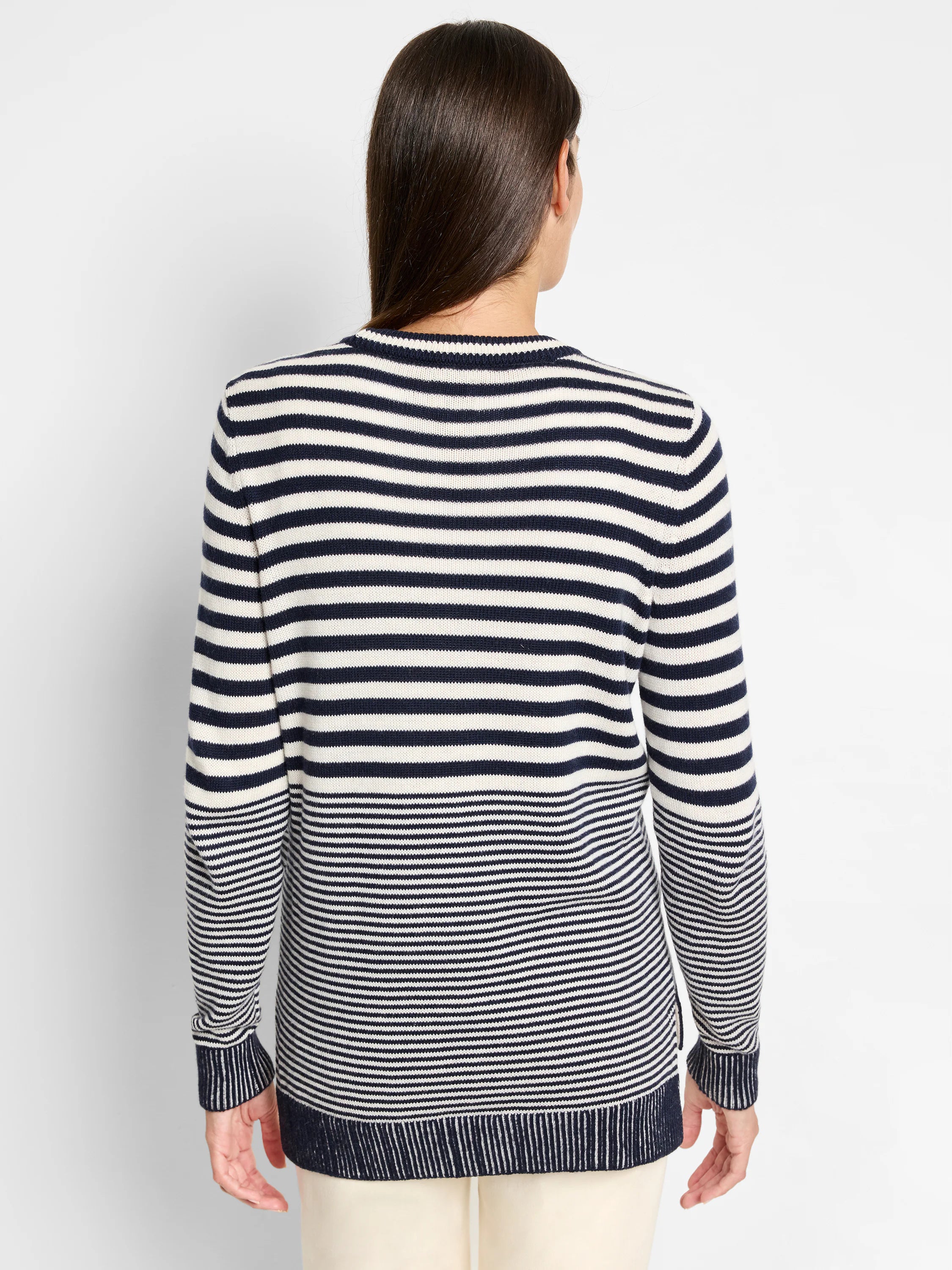 Cream and navy blue horizontal striped sweater.  Long sleeves, ribbed cuffs and hem.