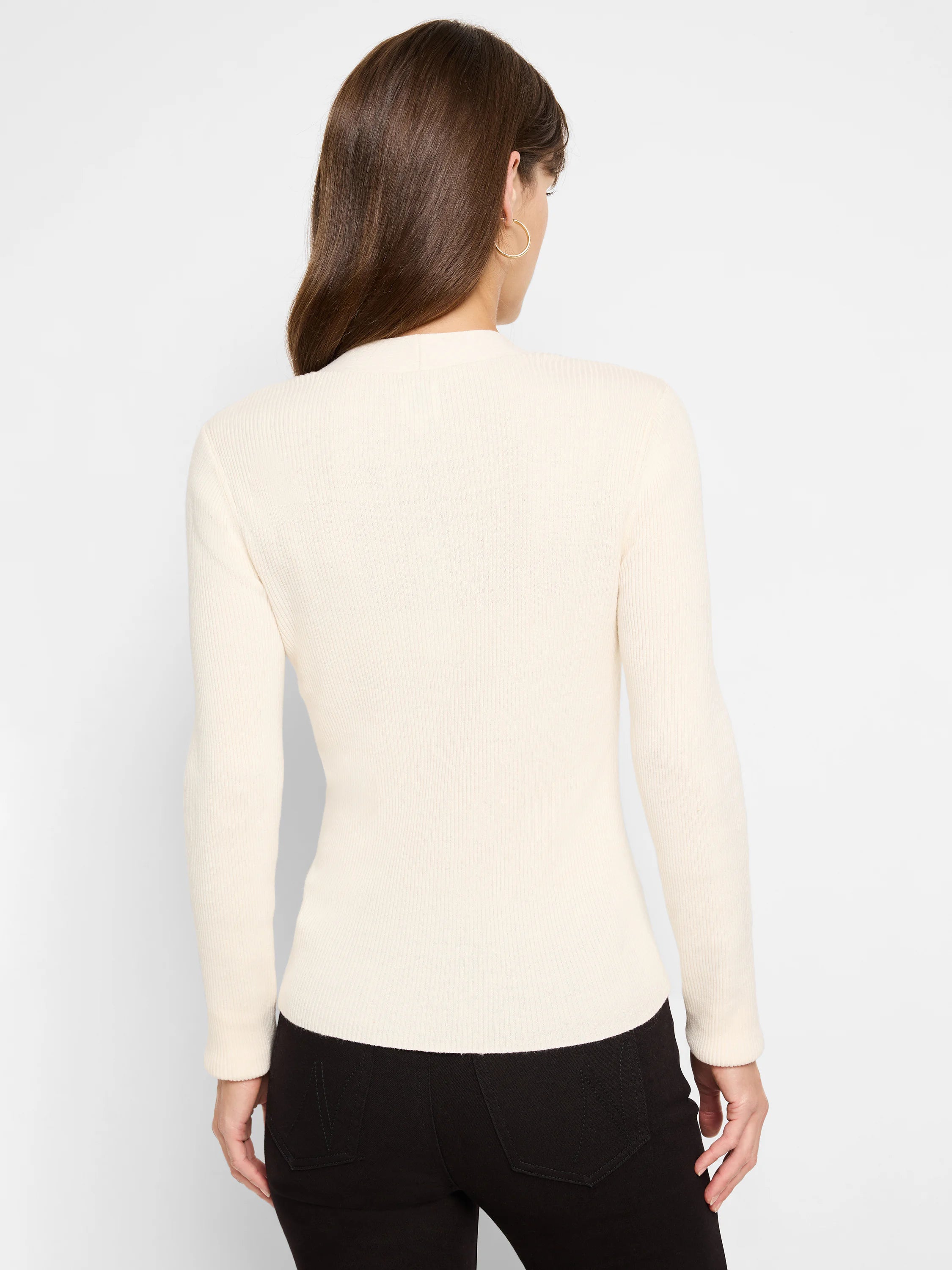 Off-white, ribbed, long-sleeved sweater.  Shown from the back.