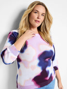 Blossom Blur Sweater:  Abstract tie-dye pattern in purple, pink, and white. Three-quarter sleeves, ribbed cuffs and hem.