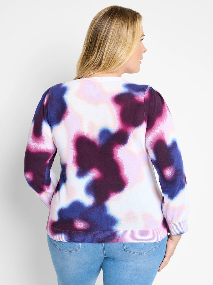 Cream sweater with purple, pink, and blue abstract tie-dye pattern. Long sleeves, crew neck.