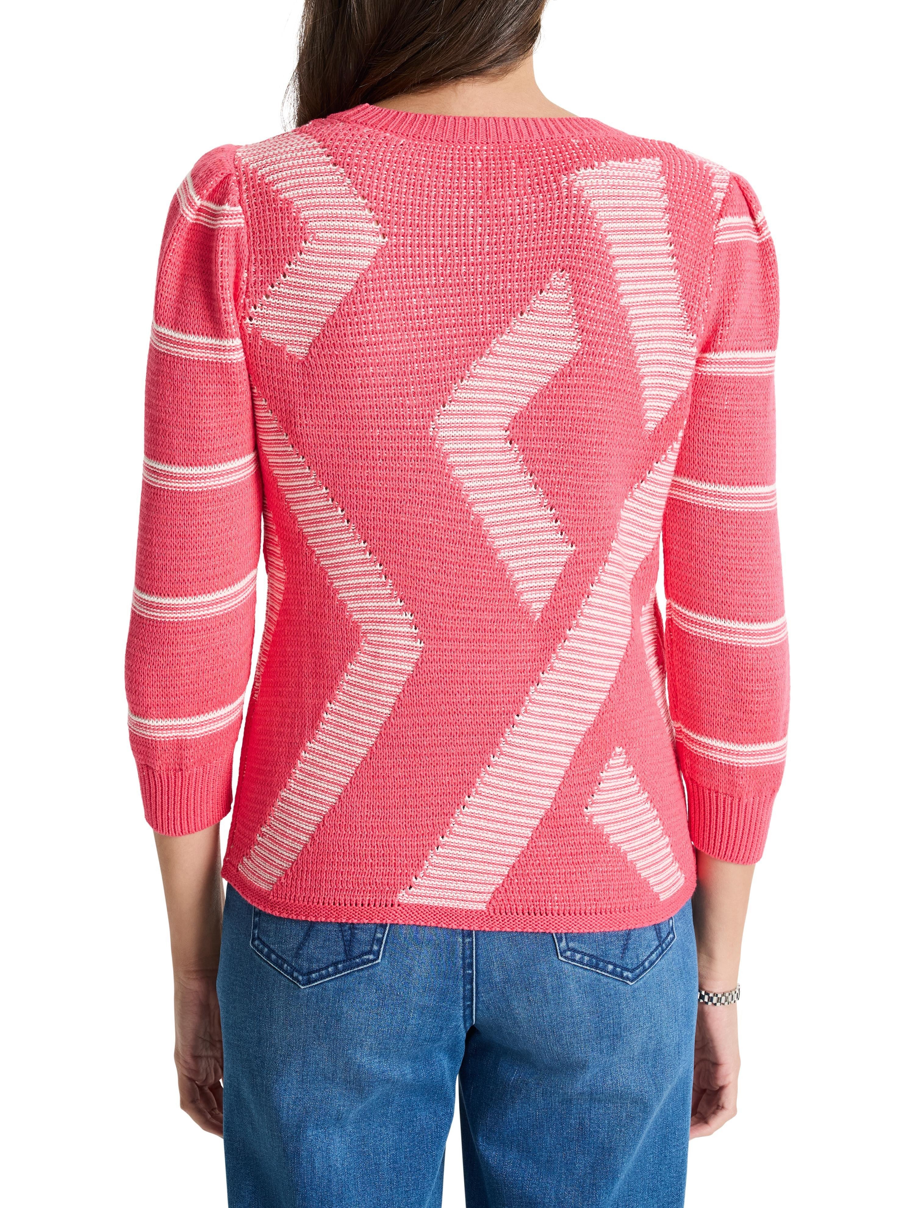 Pink sweater with white diagonal stripes and textured pattern.  Three-quarter sleeves.