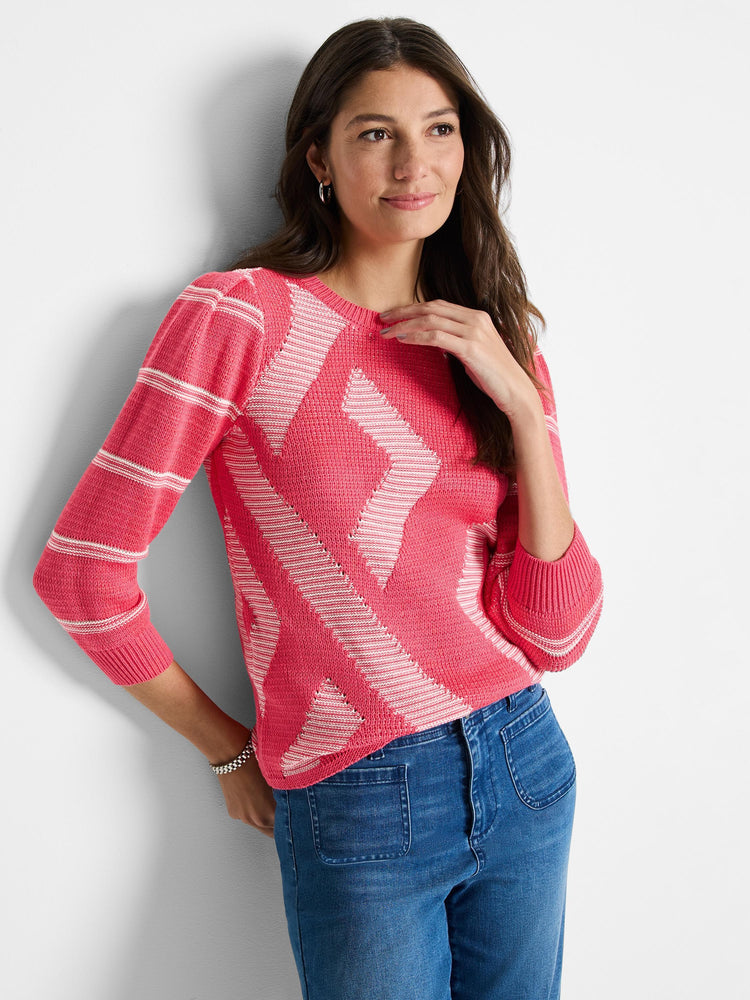 Pink sweater with white diamond pattern and stripes on sleeves.  Three-quarter sleeves. Knit fabric.