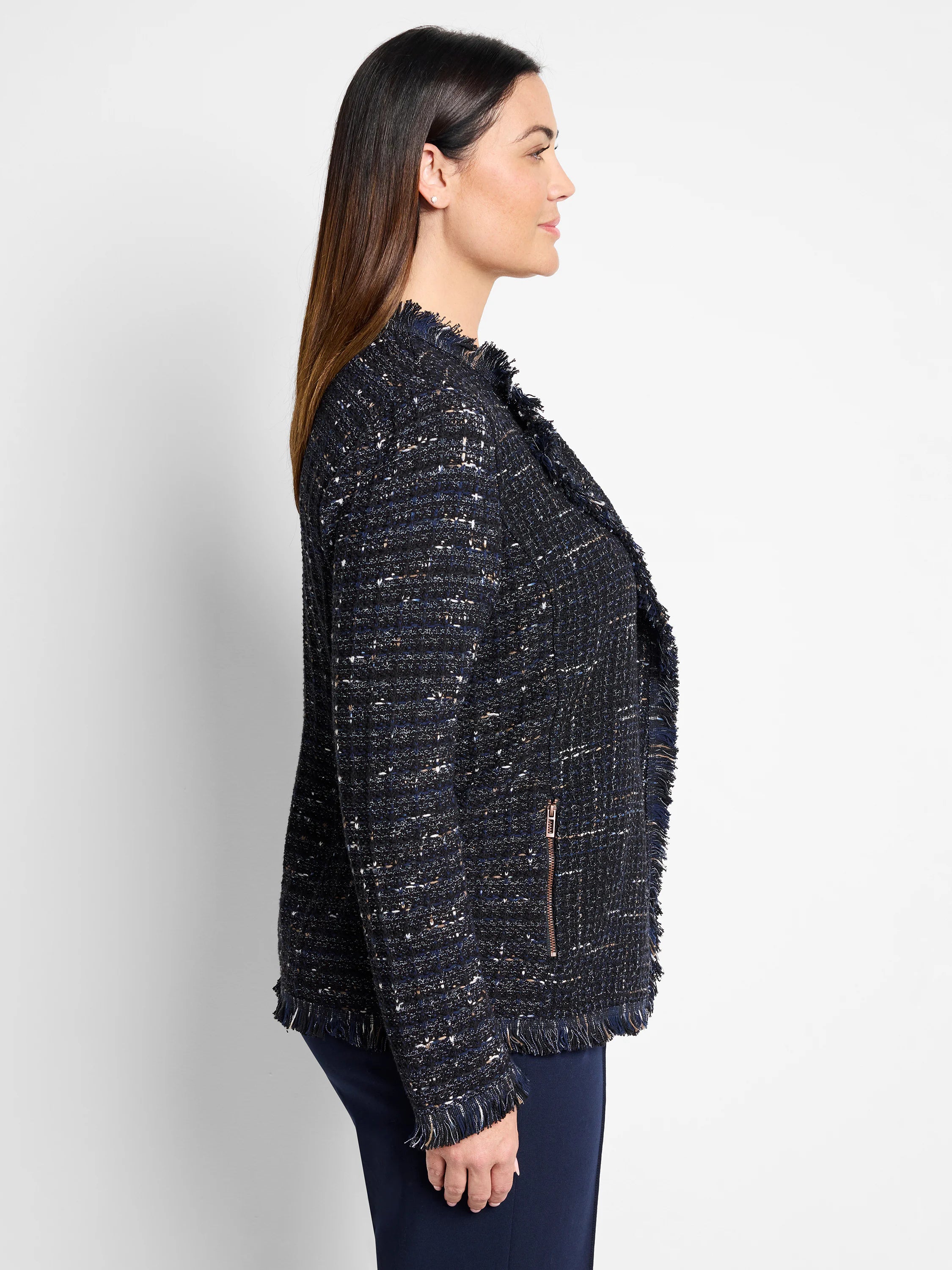 Navy blue tweed jacket with beige and silver flecks.  Fringe trim at the hem and neckline.  Features a zipper.