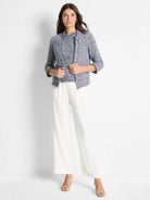 Blue and white tweed knit jacket, 3/4 sleeves, frayed edges.  Open front.