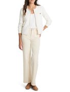 Off-white knit jacket with beige stitching detail,  front pockets, and button closures.