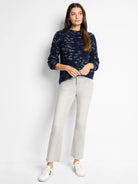 Navy blue sweater with flecks of white and gray.  Long sleeves, crew neck.