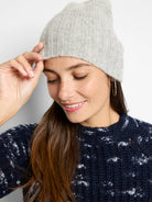 Light gray ribbed knit beanie.