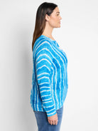 Blue and white tie-dye striped sweater.  Long sleeves, relaxed fit.