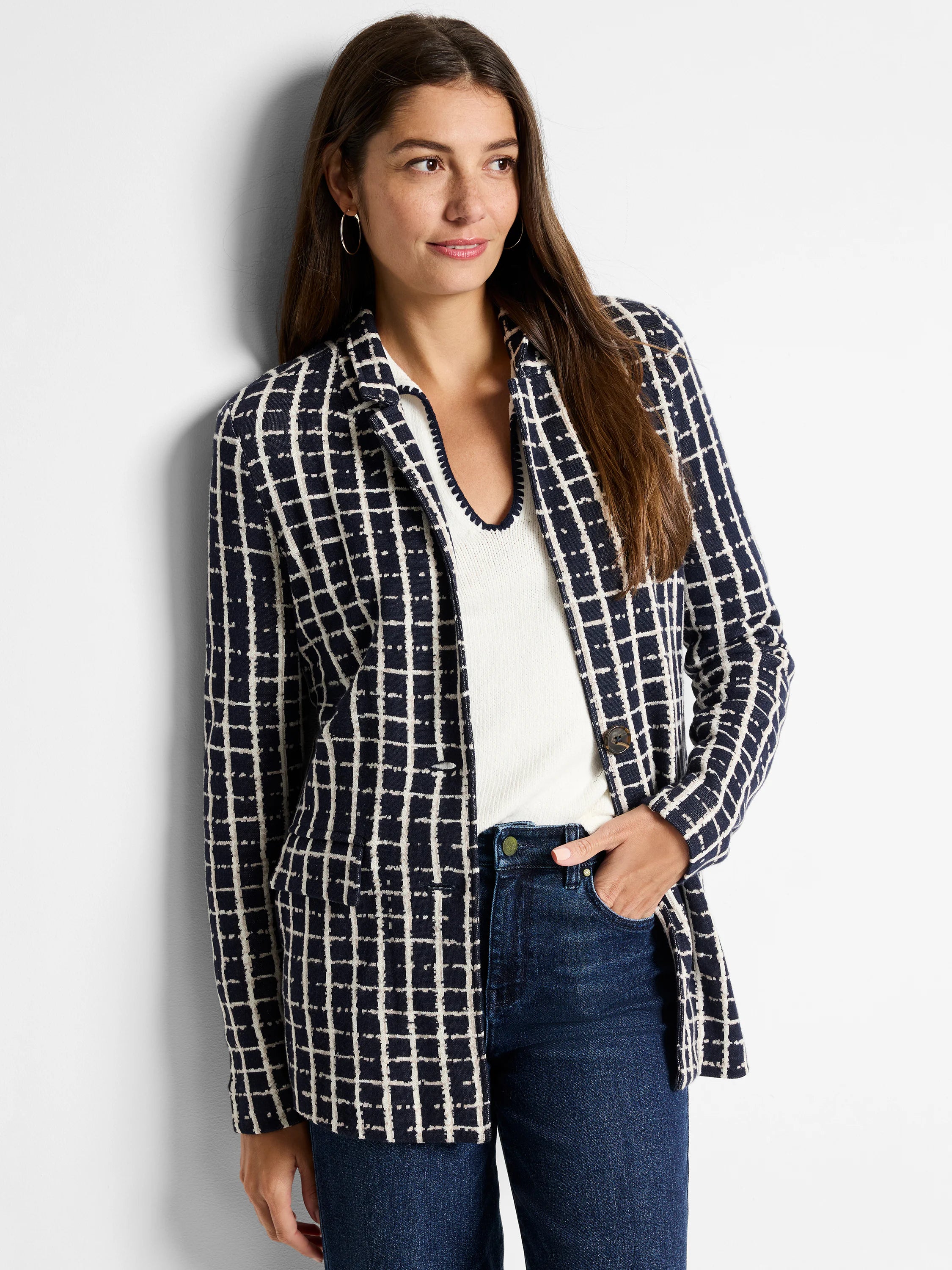 Navy blazer with an off-white grid pattern.  One button closure.