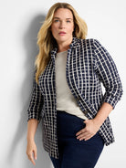 Navy blue blazer with an off-white plaid pattern. Three-quarter sleeves, open front.