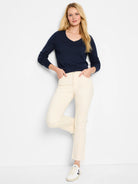 Navy blue, V-neck, long sleeve sweater.