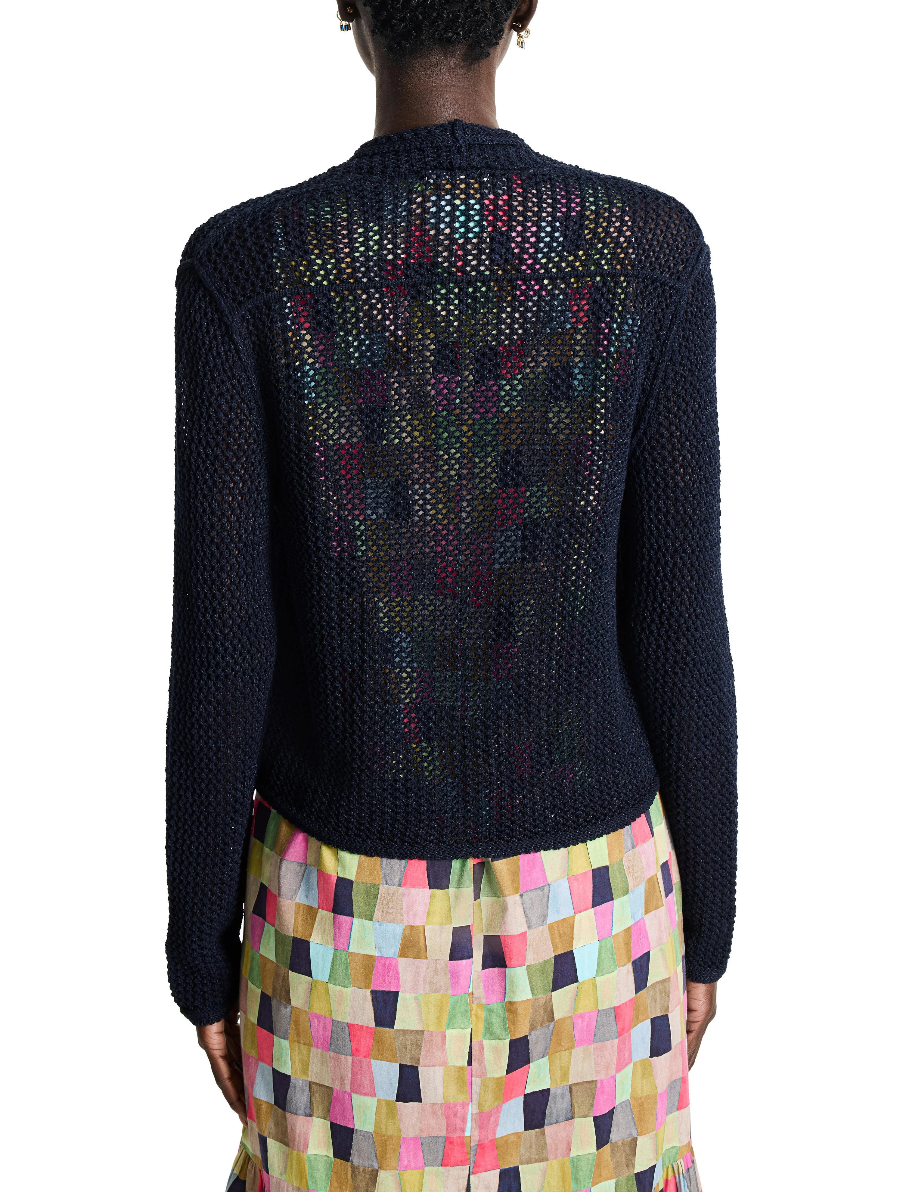 Dark navy blue mesh cardigan, open back revealing multicolored pattern.  Long sleeves.