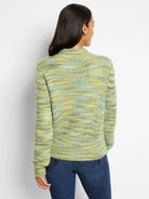Crew neck sweater in a marled knit of light green, yellow, and blue yarns, forming irregular horizontal stripes.