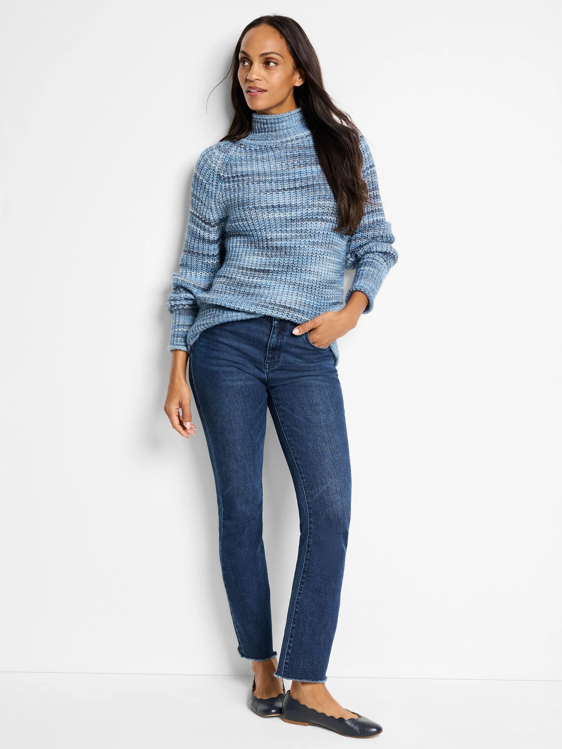 Blue and white striped, long-sleeved, turtleneck sweater.
