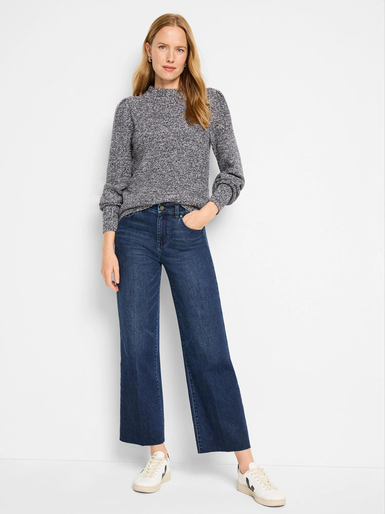 Marled grey waffle stitch sweater with a mock neck, puffed shoulders, and ribbed cuffs.