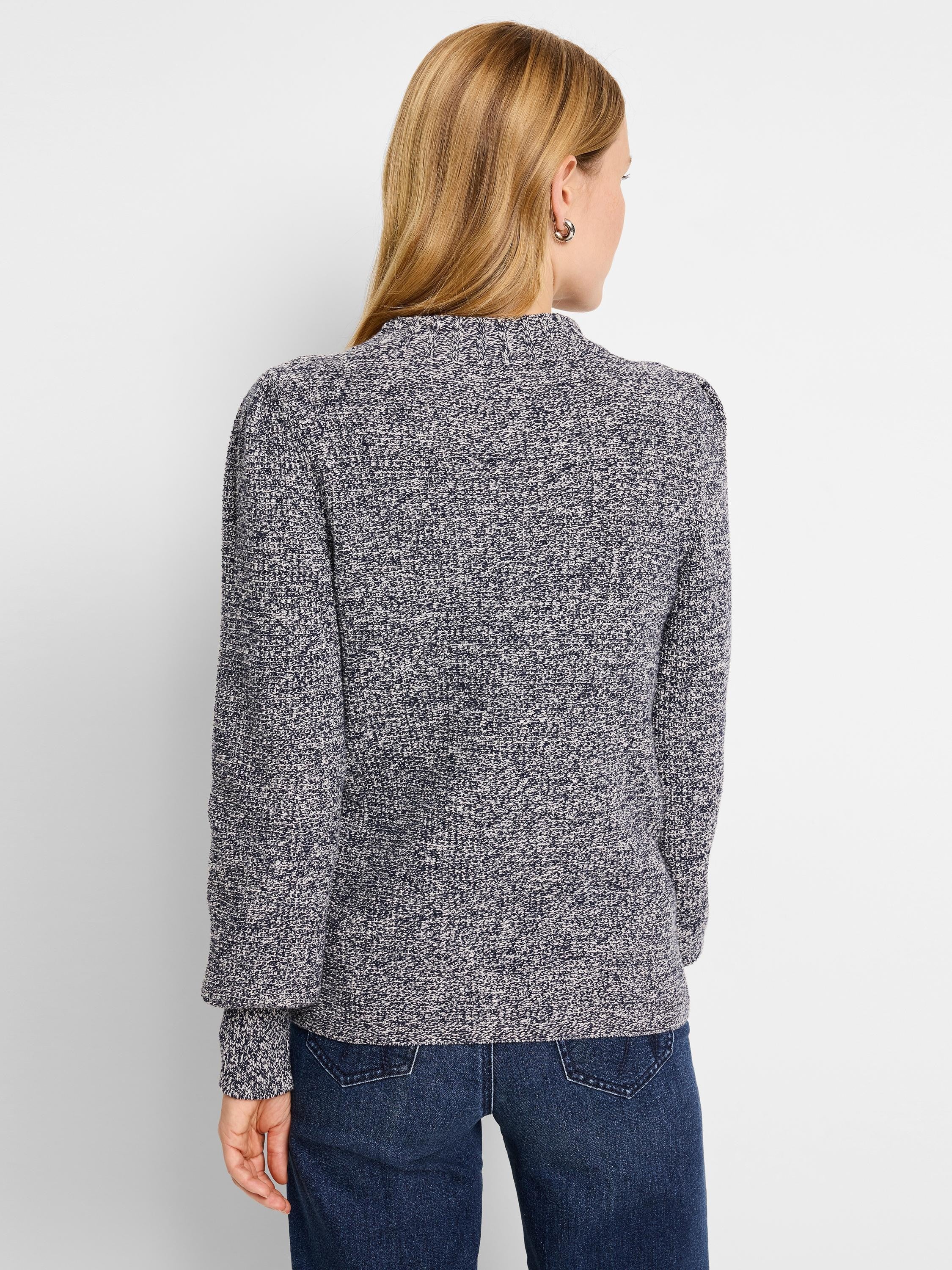 Marled navy & white waffle stitch sweater with a mock neck, subtly puffed shoulders, and ribbed cuffs.