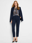 Navy blue Ponte knit trousers; straight-leg, ankle-length.  Model shown wearing them with a dark blazer and patterned top.