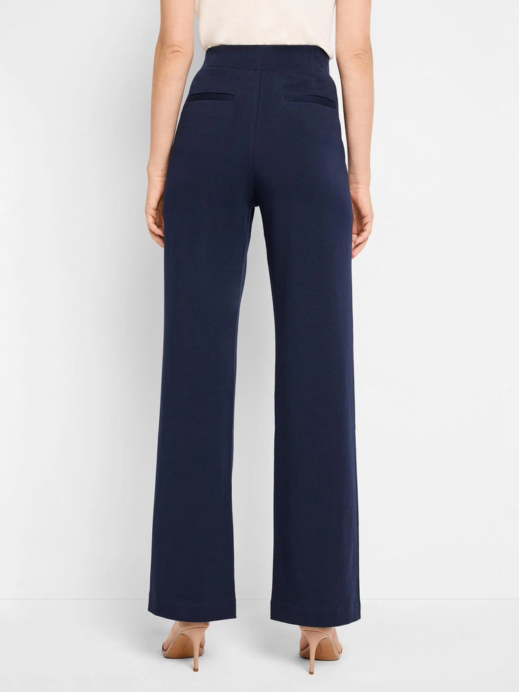 Dark navy blue wide-leg pants; high-waisted with back pockets.