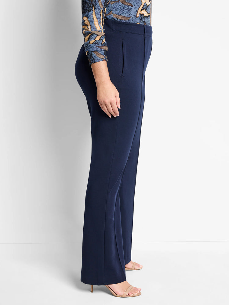 Navy blue wide-leg pleated pants; shown on a model.  The pants have a center crease and a straight, slightly flared leg.