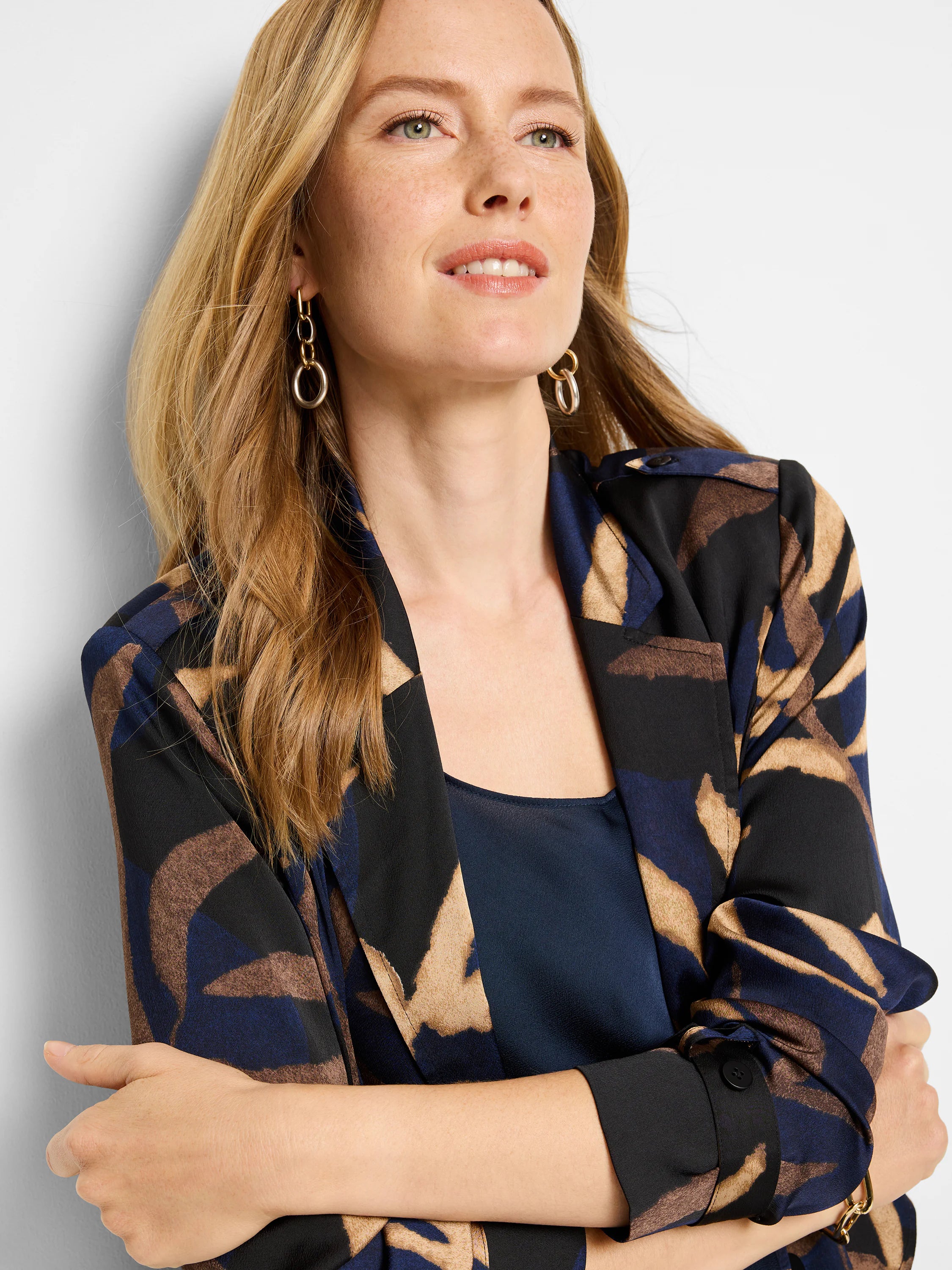 Midnight Fern trench jacket in navy, black, and beige abstract print.  Long sleeves, button cuffs.