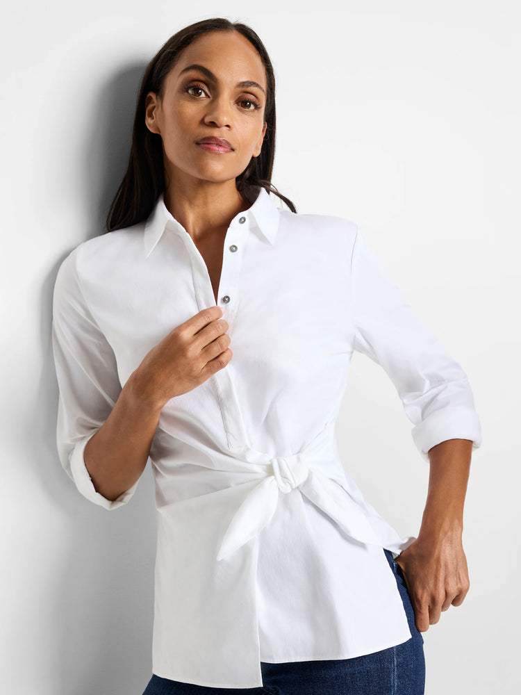 White, collared shirt with 3/4 sleeves.  The shirt is tied at the waist.  Silver buttons.