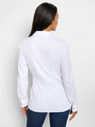 White long-sleeve collared shirt, shown from the back.  The shirt has button cuffs.