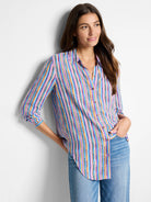 Multicolored vertical stripes on a long-sleeve button-down shirt.  Colors include purple, blue, light pink, tan, and dark...