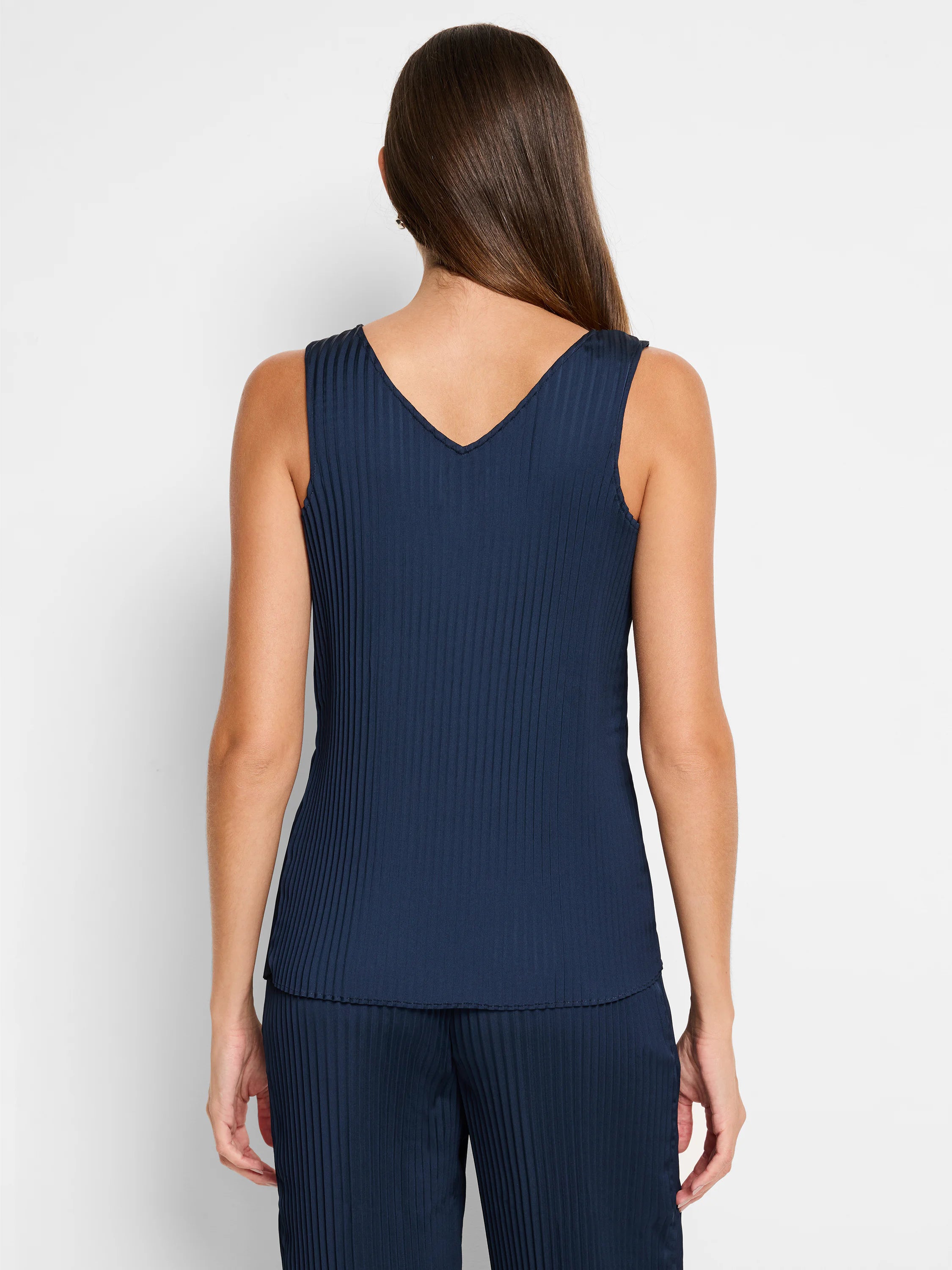 Navy blue sleeveless tank top; vertically pleated; V-neck.